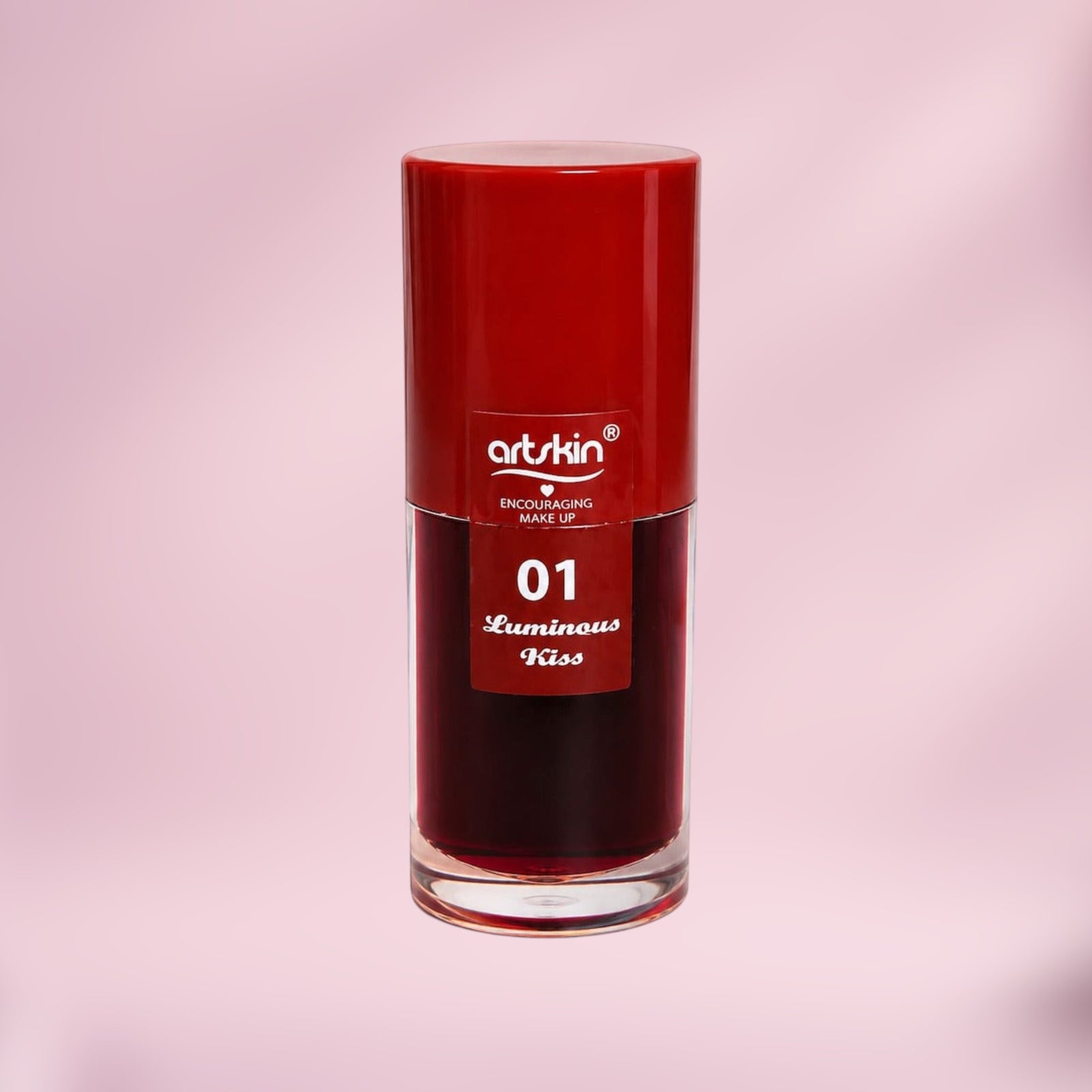 Marom Artskin Lip Tint in shade 01 Luminous Kiss, a deep red liquid lip stain in a sleek cylindrical bottle.
