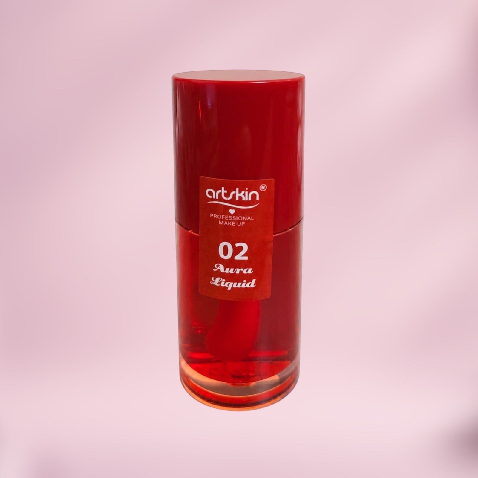 Marom Artskin Lip Tint in shade 02 Aura Liquid, a red buildable lip stain in a cylindrical bottle.