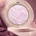 Marom MSYAHO baked powder makeup palette featuring a shimmering iridescent pink highlighter in a round gold compact.